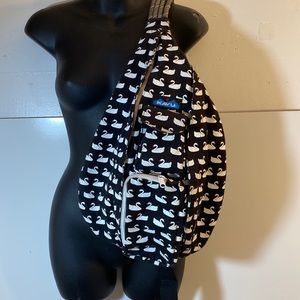 KAVU Sling Purse,with adjustable rope handle, several pockets, convenient travel